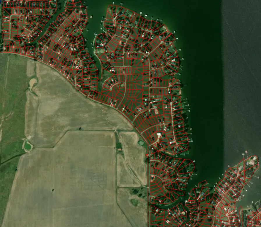 Aerial satellite view of Key Ranch Estates with parcel and street lines overlaid, showing the community along the west shore of Cedar Creek Lake