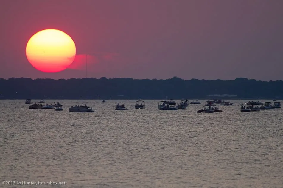 Sun low over the open water of Cedar Creek Lake